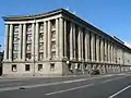 Akademie der Leichtindustrie (1934–1936 mit Leonid Poljakow, Alexander Welikanow, heute St. Petersburger Schiedsgericht), Suworowski Prospekt 50, St. Petersburg