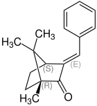 Strukturformel von (E)-(1S,4R)-3-Benzylidencampher