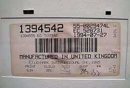Label mit Teile- und Seriennummer von 1994, Art. Nr. 1394542 aus Lexmark-Produktion. Am unteren Rand die Unterschriften von Lexmark-Mitarbeitern nach Zusammenbau und Funktionstests.