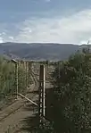 Kreuzung beider Spurweiten in der nördlichen Bahnhofseinfahrt, vor Unterbrechung des Normalspurgleises