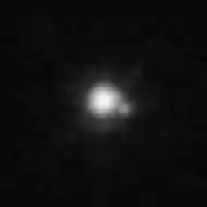 Gǃkúnǁʼhòmdímà und sein Begleiter durch das Hubble-Weltraumteleskop (2018).