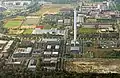 Technologiepark Bremen, Mitte: ZARM-­Instituts­gebäude und Fallturm, da­hinter: Zentral­bereich der Universität Bremen