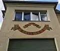 Restaurierter Putzschnitt, Sonnenuhr mit gestrichenem und teils erneuertem Putz (2016)