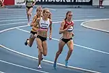 Rachel Schneider (weißes Trikot)Rang acht in 15:30,00 min