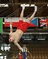 Turner aus Deutschland beim Training am Reck