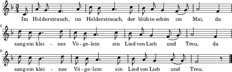 
\relative c'
{  \key f \major \time 3/4  \autoBeamOff
\partial 8 c8 | a' g f4. a8 | c bes a4. c8 | bes a g4 f8( g) | a2 f4 |
d'8 c bes4. d8 | c bes a4. c8 | bes a g4 f8( g) | a2 f4 |
d'8 c bes4. d8 | c bes a4. c8 | bes a g4 a8( g) | f2 r8 \bar "|." } 
\addlyrics 
{ 
Im Hol -- der -- strauch, im Hol -- der -- strauch,
der blüh -- te schön im Mai,
da sang ein klei -- nes Vö -- ge -- lein
ein Lied von Lieb und Treu,
da sang ein klei -- nes Vö -- ge -- lein
ein Lied von Lieb und Treu.
} 