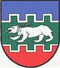 Von Blau, Grün und Rot durch silberne Gegenzinnenleisten geteilt (Schäffern AT)