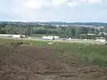 Baustelleneinrichtung Bereich Westportal (Juli 2016). Im Hintergrund die A8.