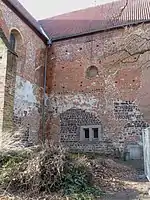Chor und Nordquerhaus: Anschlüsse der im 18. Jh. abge­brochenen Nikolai­kapelle, ver­schlossen mit Rasen­eisen­stein