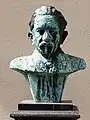 Büste von 1921 für Dr. Hans Huber (1852–1927) Komponist, Pianist und Musikpädagoge. Von Otto Roos (1887–1945), Bildhauer, Maler, Zeichner. Standort: Hof der Musik Akademie Basel