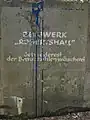 Inschrift auf den Fundamentresten der ehemaligen Kohlenwäsche 2011