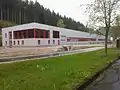 2013: Fabrikneubau auf dem ehemaligen Bahnhofsgelände