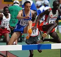 Bouabdellah Tahri, 2006 EM-Dritter (blaues Trikot) – Rang fünf /Tareq Mubarak Taher (ganz rechts) – Rang acht