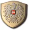 Kappenemblem Verwendungsgruppe E 1 und Rechtskundiger Dienst