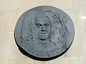 Bronzerelief von Johann Maria Farina (erstellt von Wolfgang Reuter)