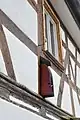 CHC Geiselhart: Animali­scher Haus­wächter, Holz farbig gefasst, Luppachstraße 39 (2022)