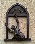 Schusterjunge, eine von 7 Bronzeskulpturen am Witzerundweg in Calau (Schlossstraße 29–30)