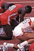 Start im 100-m-Rennen: Carl Lewis (links in Rot) und Christian Haas (weißes Trikot)