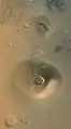 Ceraunius und Uranius Tholus