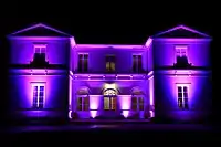 Schloss La Rairie am Abend