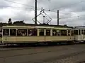 langer Zwei­achser mit Mit­tel­ein­stieg, Ber­lin Bau­art 1927; Steue­rung und Brem­sen mach­ten Prob­le­me und muss­ten er­setzt wer­den