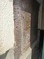 Reststück eines Viertelmeilensteines