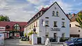 Wohnstallhaus und Scheune eines ehemaligen Dreiseithofes