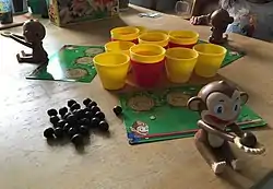 Spielmaterial des Spiels Crazy Coconuts,Aufbau für drei Spieler