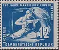 1950 750 Jahre Mansfelder Kupferschieferbergbau Bergmann mit Presslufthammer im Stollen
