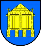 Das Wappen von Husby mit dem Holzhaus