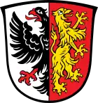 Hinten ein linksgewendeter goldener Greifenlöwe im Wappen von Jengen