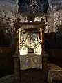 An der Ikone der Jungfrau im Tempel