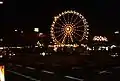 Hamburger Dom mit dem beleuchteten Riesenrad