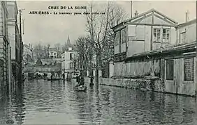 « Le tramway passait dans cette rue d'Asnières-sur-Seine » („Die Straßenbahn fuhr durch diese Straße von Asnières-sur-Seine“)