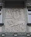 Relief mit trinkendem Hirsch