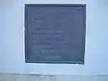 Bronzeplakette mit Text