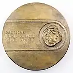 Eligiuspreis-Medaille (von 1992 bis 2019 vergebene Form) des Preisträgers Peter Götz Güttler(Bronzierter Weißmetallguss, 106 mm, um 700 g)