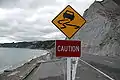 Erodierte Straße bei Whatarangi Bluff an der Palliser Bay