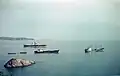 Eisenerzverladung in der Metalliabucht, hinten SS Estrella, vorne v. l.: MS Marabu und MS Nordwind (1957)