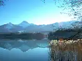 Blick über den Faaker See in Richtung Karawanken mit dem Mittagskogel