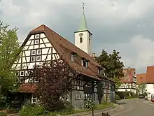 „Krone“, Kirchturm und Pfarrhausin Warmbronn