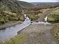 Furt an der Mündung des Lamb Burn (halblinks) in das Faseny Water (von rechts)