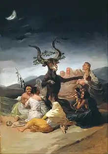 Personen bei der Anbetung des gehörnten Gottes