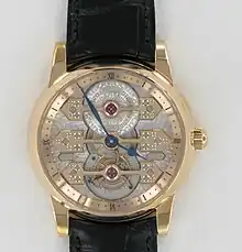 Tourbillon mit drei goldenen Brücken