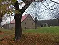 Huthaus (heute Wohnhaus) und Ruine der ehemaligen Bergschmiede (Einzeldenkmale der Sachgesamtheit 08955769)