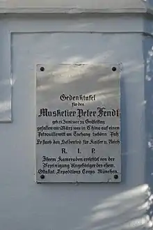 Spuren des Ostasiatischen Korps in Bayern. Gedenktafel für einen gefallenen Soldaten in Gräfelfing.