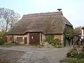 Regionaltypisches Reetdachhaus