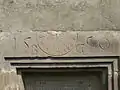 Sonnenuhr am Kirchenportal