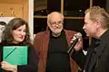 Preisverleihung des Papierenen Gustl 2013 v. l. n. r. Maria Hofstätter, Herbert Wilfinger, Ulrich Seidl (Bester Österreichischer Film 2013 „Paradies: Glaube“)