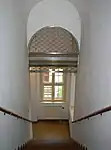Treppenhaus mit Rollgitter